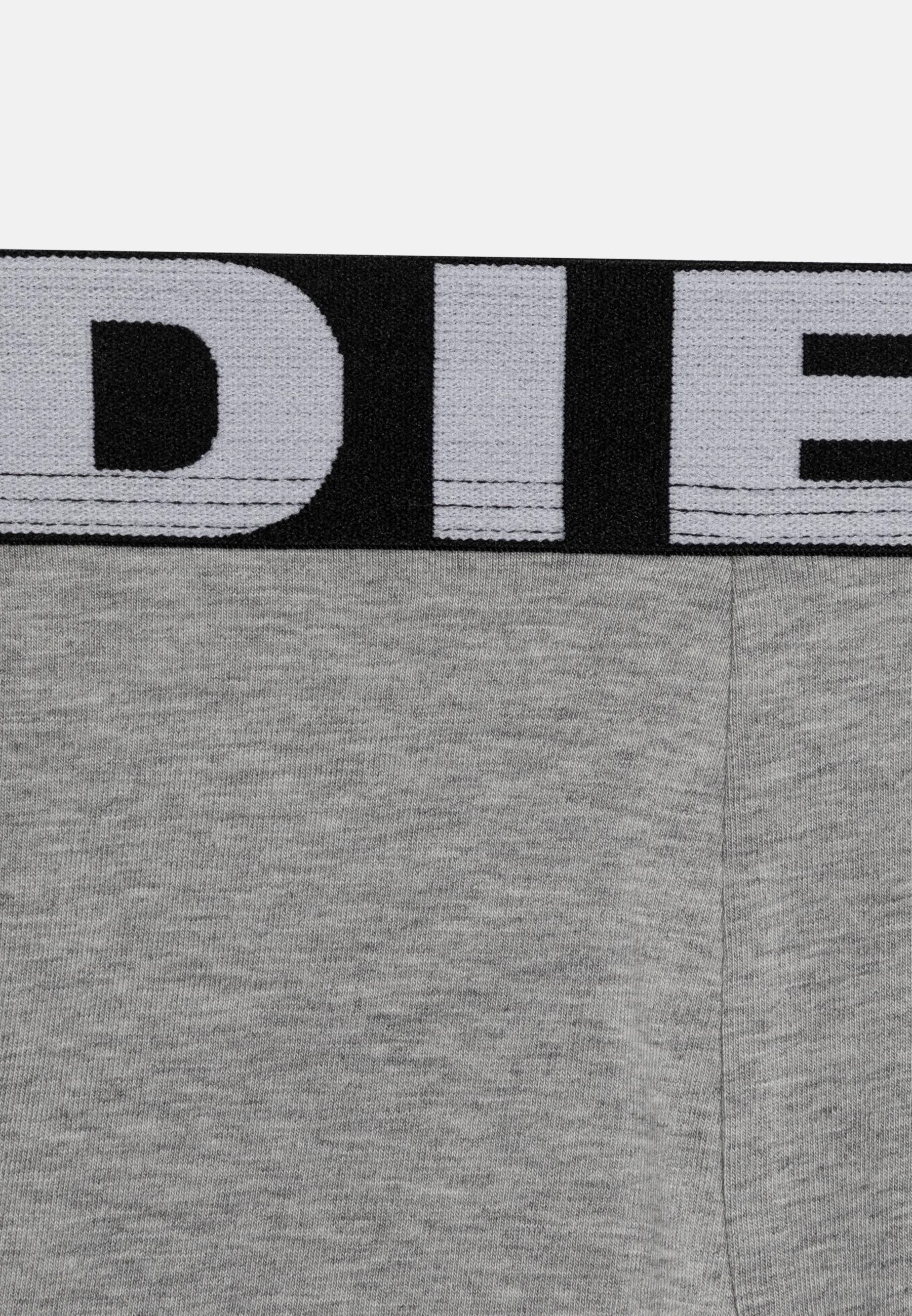 Boxer lungo da bambino in jersey di cotone stretch. Elastico in vita metallizzato con maxi scritta Diesel all-over. J01911-KYAYJ K9008 DIESEL 